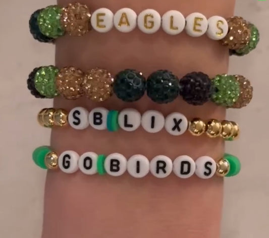 Eagles gold bracelet stack