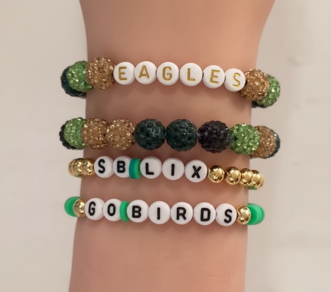 Eagles gold bracelet stack