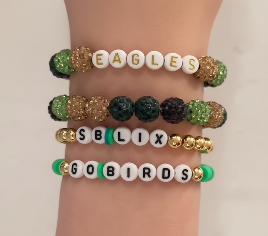 Eagles gold bracelet stack